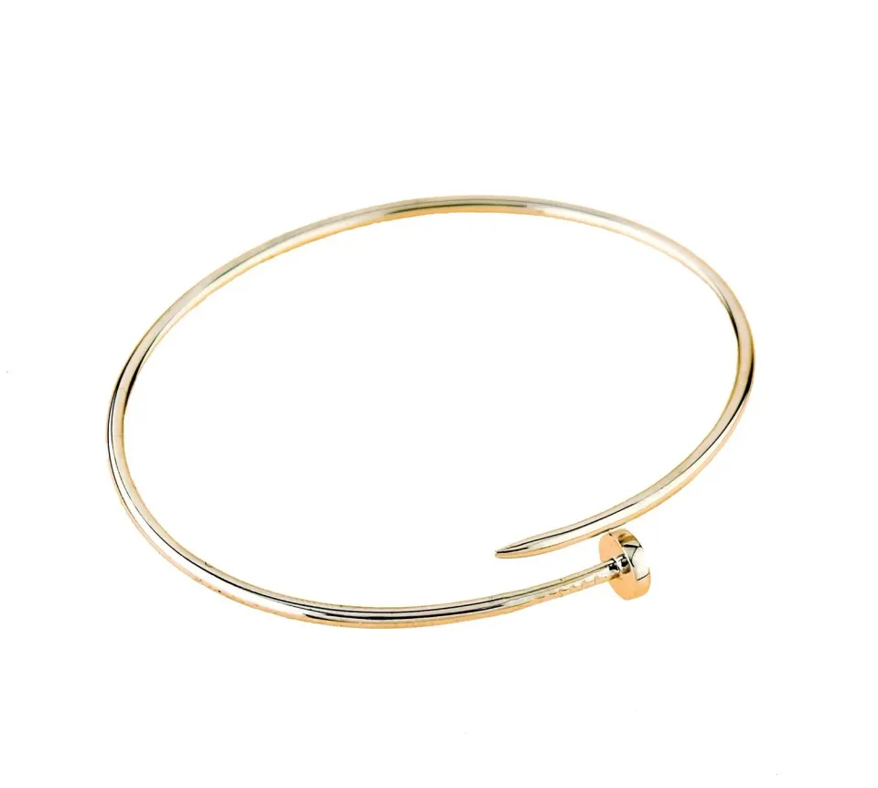 Gioielli Celiento Bracciale rigido oro giallo 18Kt chiodo